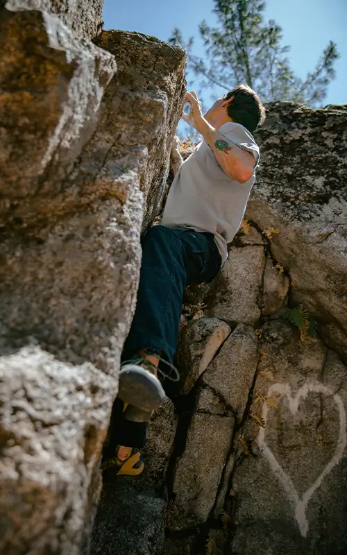 man climbing in Needles